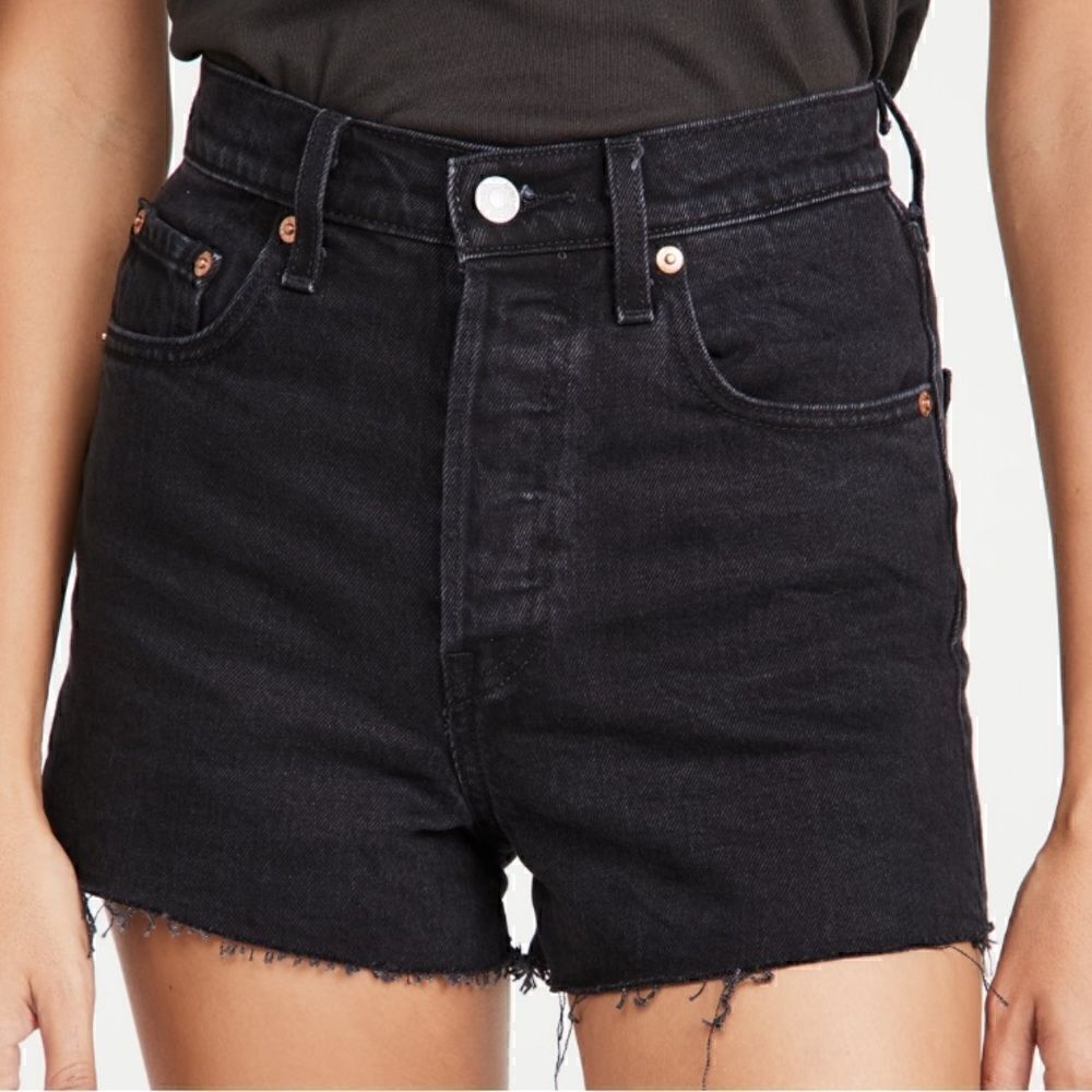 Levi’s Ribcage High Waisted Cutoff Shorts in Black Bayou Washed Black